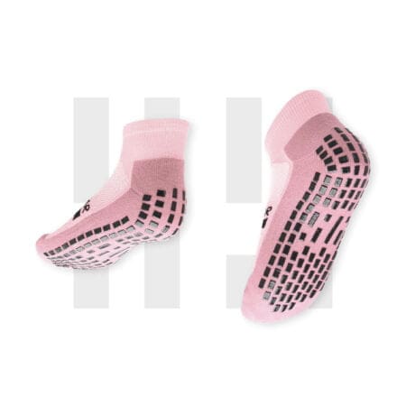 Pair of pastel pink ankle socks by Grip Star Socks.