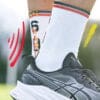 Xavier Coates PNG crew socks by Grip Star Socks.