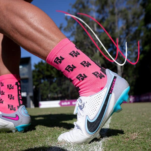 Reece Walsh pink crew socks by Grip Star Socks.