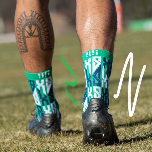 Xavier Savage green crew socks by Grip Star Socks.