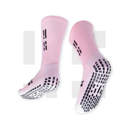Pair of pastel pink crew socks by Grip Star Socks.